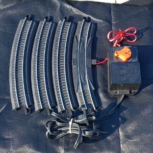 Electric Train Track Set with Black Tracks and Red Controller
